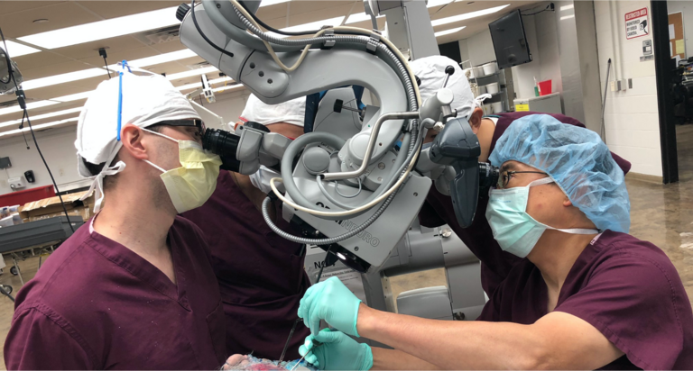 Neurosurgery residents working with Dr. Yamaguchi during far lateral exposure