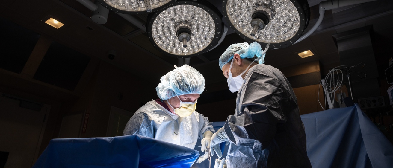 Neurosurgery residency on Wednesday, Sept. 17, 2025. Residents Clayton Rosinski (white mask) and Anthony Marincovich (yellow mask).